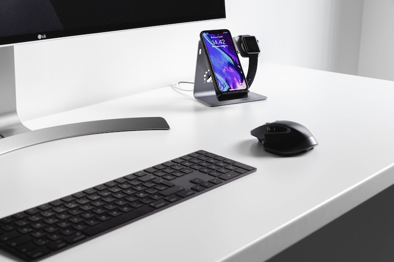 Phone on phone stand on a desk