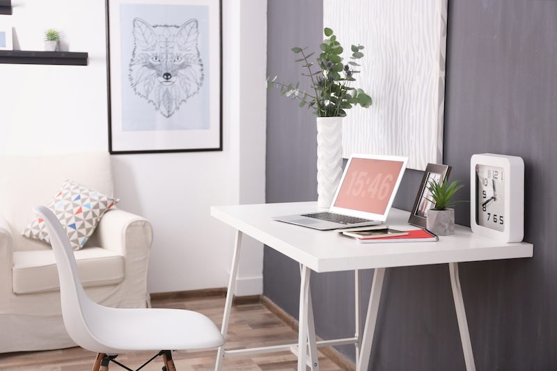 Minimalist office white desk grey walls