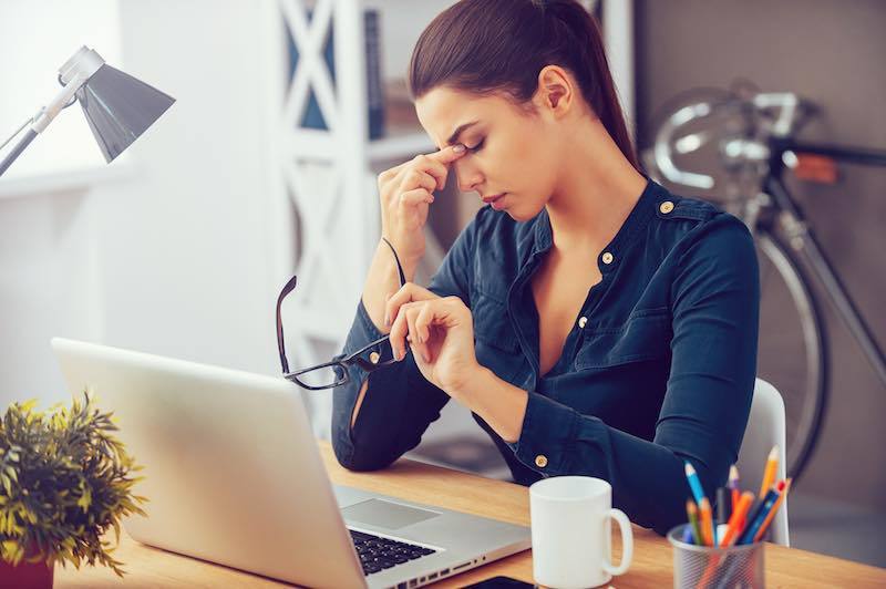 Woman looking for ways to relieve stress at work